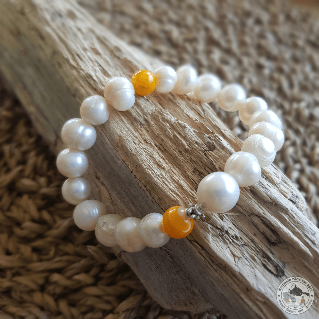 Armband "Khol Moti" (शेल गर्नुहोस्) - Namaste Kids Help Shop